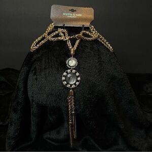 Long Gold Necklace with Black and Silver Accents